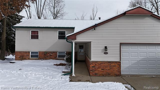 front view for 1535 Kings Crown Ct, Wixom, Mi. 48393