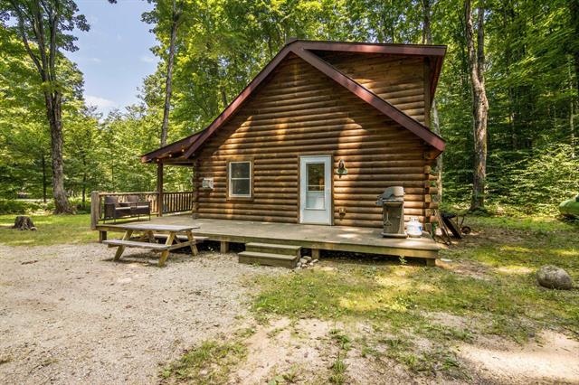 Builiding view three for 5845 West Village Drive, Bellaire, MI. 49615