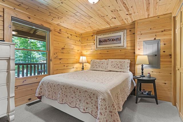 Builiding view twelve for 5845 West Village Drive, Bellaire, MI. 49615