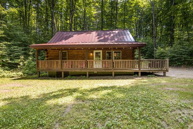 Builiding view twenty three for 5845 West Village Drive, Bellaire, MI. 49615