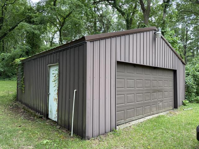 Builiding view ten for 1615 Gilletts Lake, Jackson, MI. 49201