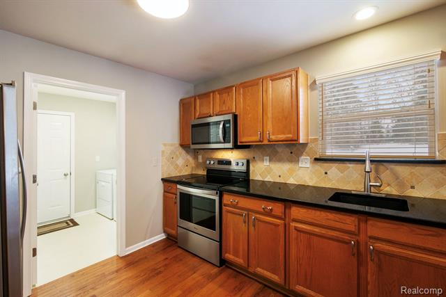 Builiding view seventeen for 671 Woodhaven, Walled Lake, MI. 48390