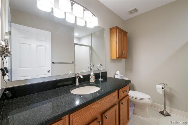 Builiding view twenty three for 671 Woodhaven, Walled Lake, MI. 48390