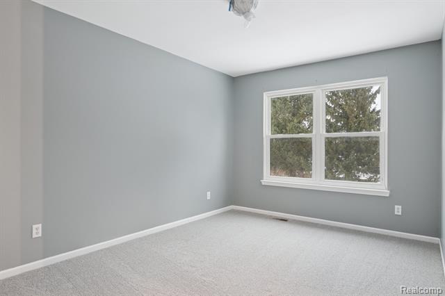 Builiding view twenty four for 1040 Drakeshire, Walled Lake, MI. 48390