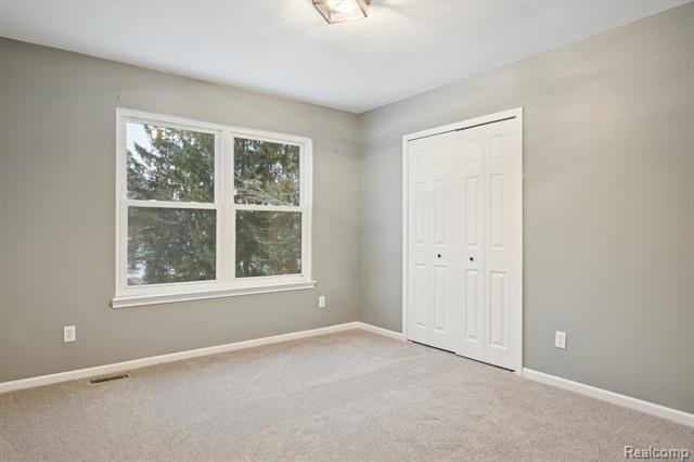 Builiding view twenty three for 1040 Drakeshire, Walled Lake, MI. 48390