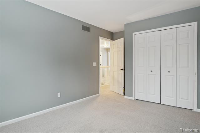 Builiding view twenty two for 1040 Drakeshire, Walled Lake, MI. 48390