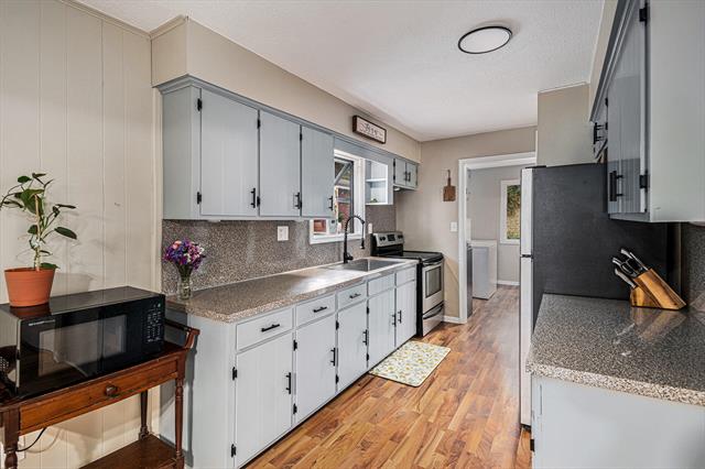 Builiding view ten for 5801 Maple, Twin Lake, MI. 49457