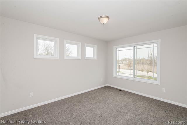 Builiding view thirty two for 53183 Woodland Meadows, New Baltimore, MI. 48047