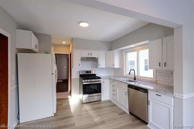 Builiding view fourteen for 329 7Th, Monroe, MI. 48161