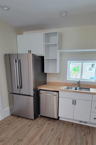 Builiding view ten for 260 Fremont, Manistee, MI. 49660