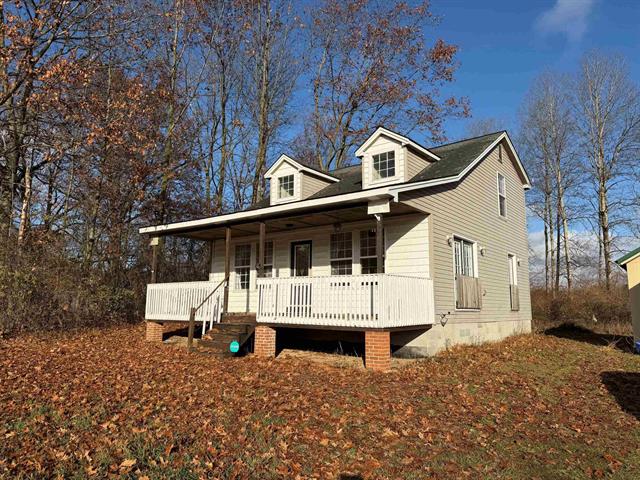 front view for 1040 Cordoba, Weidman, Mi. 48893