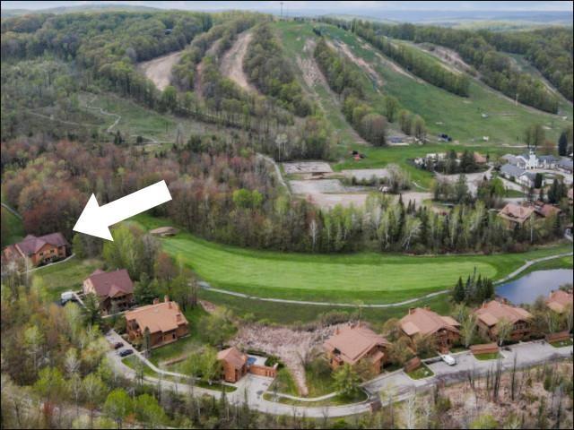 Builiding view twenty four for 2100 Schuss Mountain, Bellaire, MI. 49615