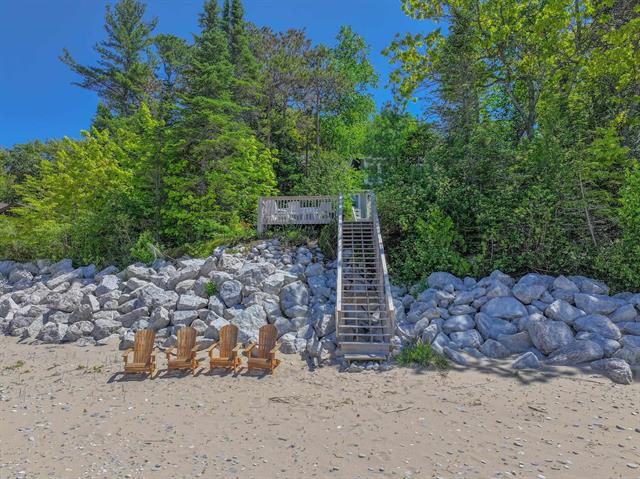 Builiding view eleven for 5635 Leland Woods, Leland, MI. 49654