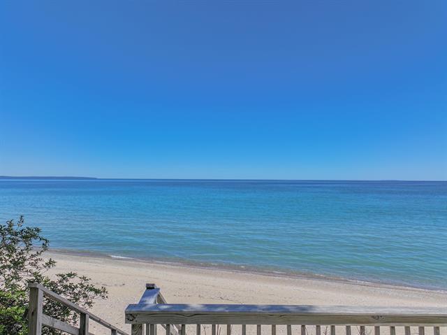 Builiding view fifty five for 5635 Leland Woods, Leland, MI. 49654