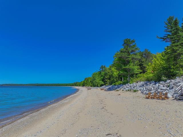 Builiding view fifty three for 5635 Leland Woods, Leland, MI. 49654