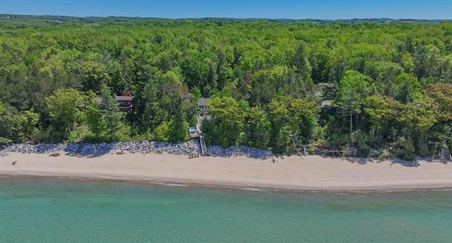 Builiding view fifty for 5635 Leland Woods, Leland, MI. 49654