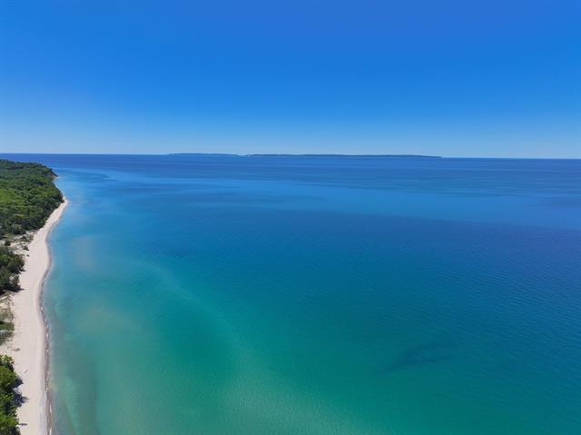 Builiding view forty nine for 5635 Leland Woods, Leland, MI. 49654