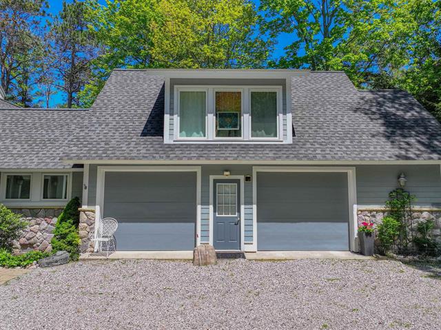 Builiding view four for 5635 Leland Woods, Leland, MI. 49654