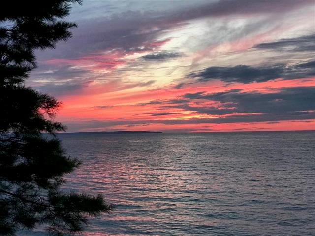 Builiding view sixty four for 5635 Leland Woods, Leland, MI. 49654