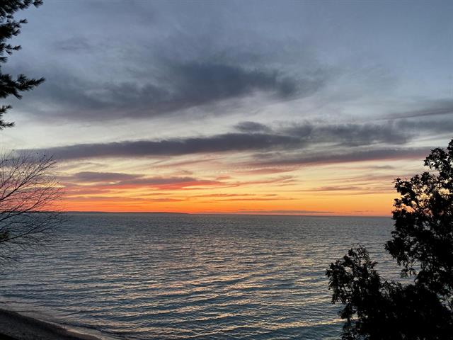 Builiding view sixty seven for 5635 Leland Woods, Leland, MI. 49654