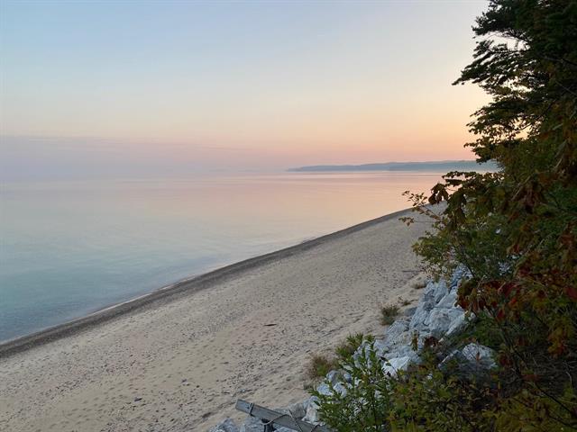 Builiding view sixty for 5635 Leland Woods, Leland, MI. 49654