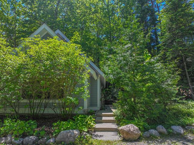 Builiding view thirty seven for 5635 Leland Woods, Leland, MI. 49654