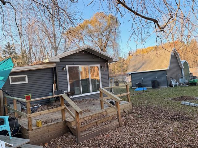 Builiding view five for 7986 Little Penny, Six Lakes, MI. 48886