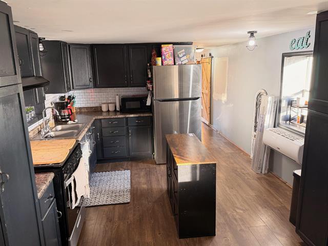 Builiding view nine for 7986 Little Penny, Six Lakes, MI. 48886