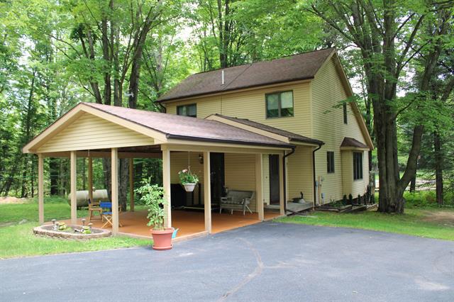 front view for 7227 Greenwood Rd Road, Gladwin, Mi. 48624