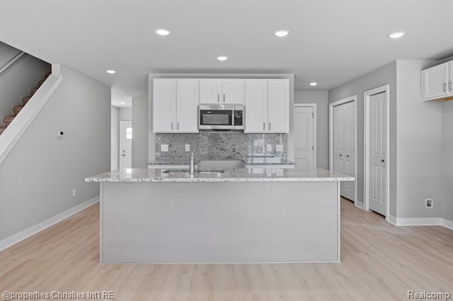 Builiding view five for 100 Parsons Lane, Saline, MI. 48176