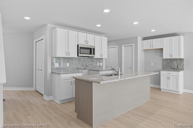 Builiding view four for 100 Parsons Lane, Saline, MI. 48176