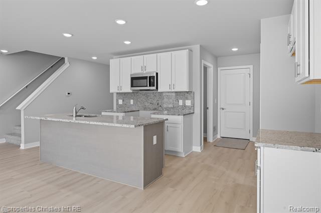 Builiding view six for 100 Parsons Lane, Saline, MI. 48176