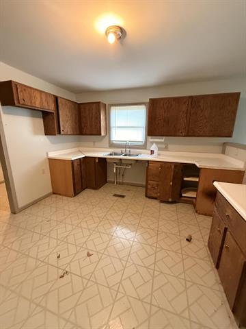 Builiding view four for 543 Dennis, Ludington, MI. 49431