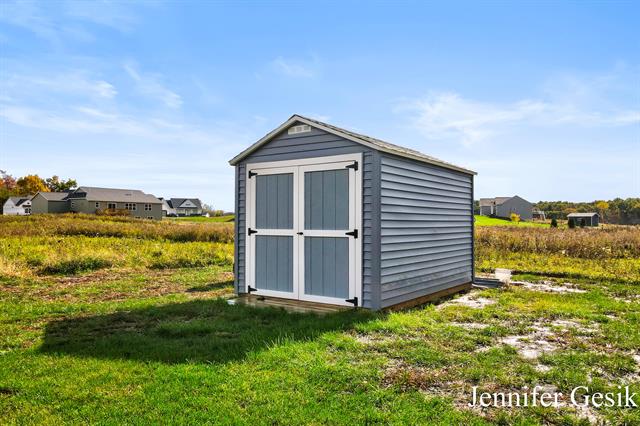 Builiding view fifty seven for 12020 Alden, Lowell, MI. 49331