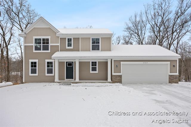 front view for 4767 Leaf Court Pvt Drive, Pierson, Mi. 49339