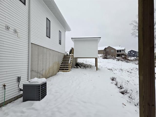 Builiding view sixty three for 9465 Wabasis Pointe, Greenville, MI. 48838