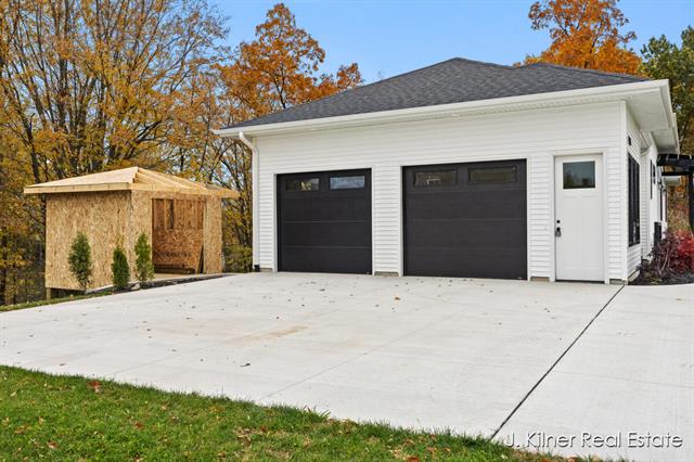 Builiding view sixty two for 9465 Wabasis Pointe, Greenville, MI. 48838