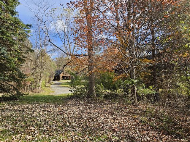 Builiding view nine for 121 Davis Lake, Lapeer, MI. 48446