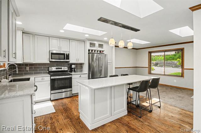 Builiding view eight for 520 E Huron, Milford, MI. 48381