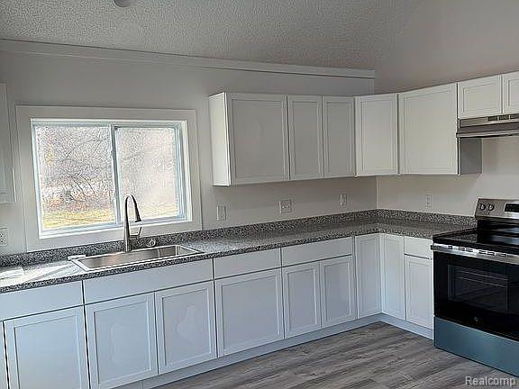 Builiding view three for 3860 Tower Hill, Houghton Lake, MI. 48629