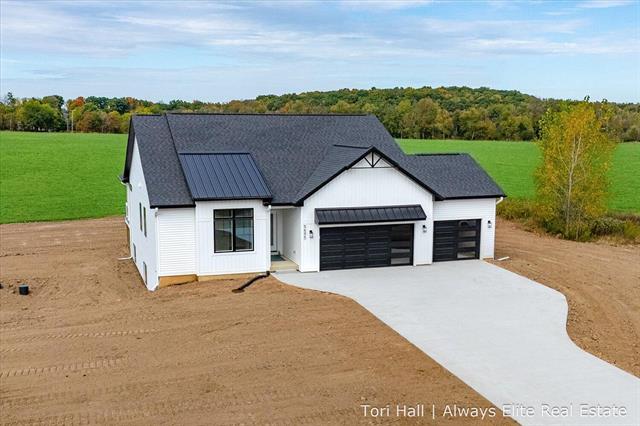 front view for 5695 Elmgrove Avenue, Richland, Mi. 49083