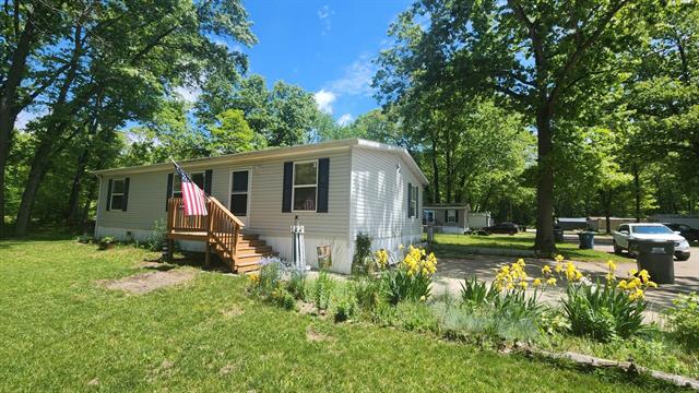 front view picture of 2371 Maple Ln Avenue, Dorr, MI. 49323