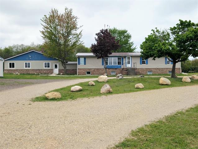 front view for 11701 N Vandecar Road, Farwell, Mi. 48622