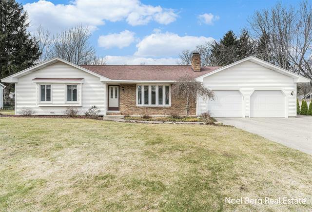 front view for 16335 Pinewood Avenue, Spring Lake, Mi. 49456