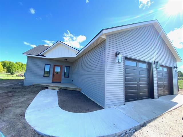 front view for 7640 Cameron Court, Lake Ann, Mi. 49650