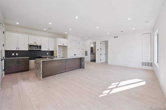 Builiding view seventeen for 120 E Liberty, Milford, MI. 48381