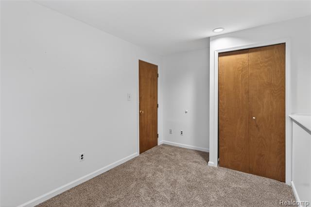 Builiding view forty seven for 8360 Arlis, Commerce Township, MI. 48382