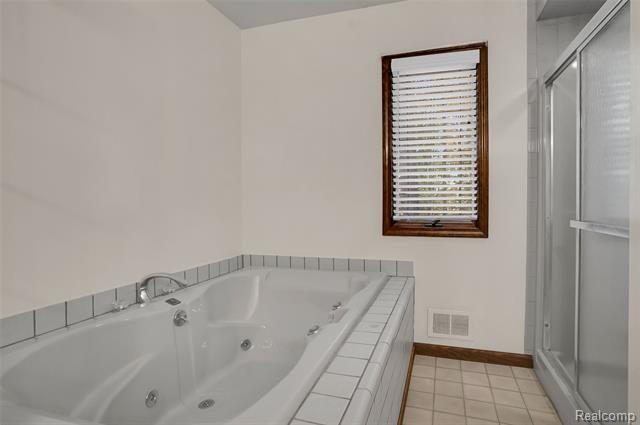 Builiding view eighteen for 1431 E Commerce, Commerce Township, MI. 48382