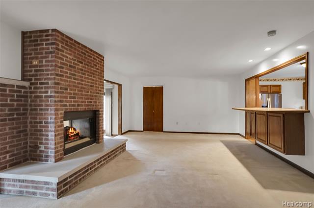 Builiding view eleven for 1431 E Commerce, Commerce Township, MI. 48382