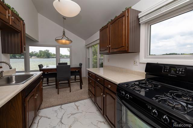 Builiding view eleven for 8691 Cooley Lake, Commerce Township, MI. 48382